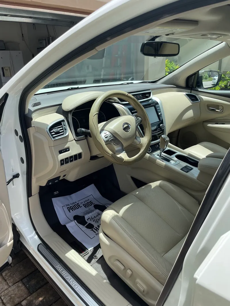 Nissan Murano beige leather interior professionally cleaned in North Port, FL