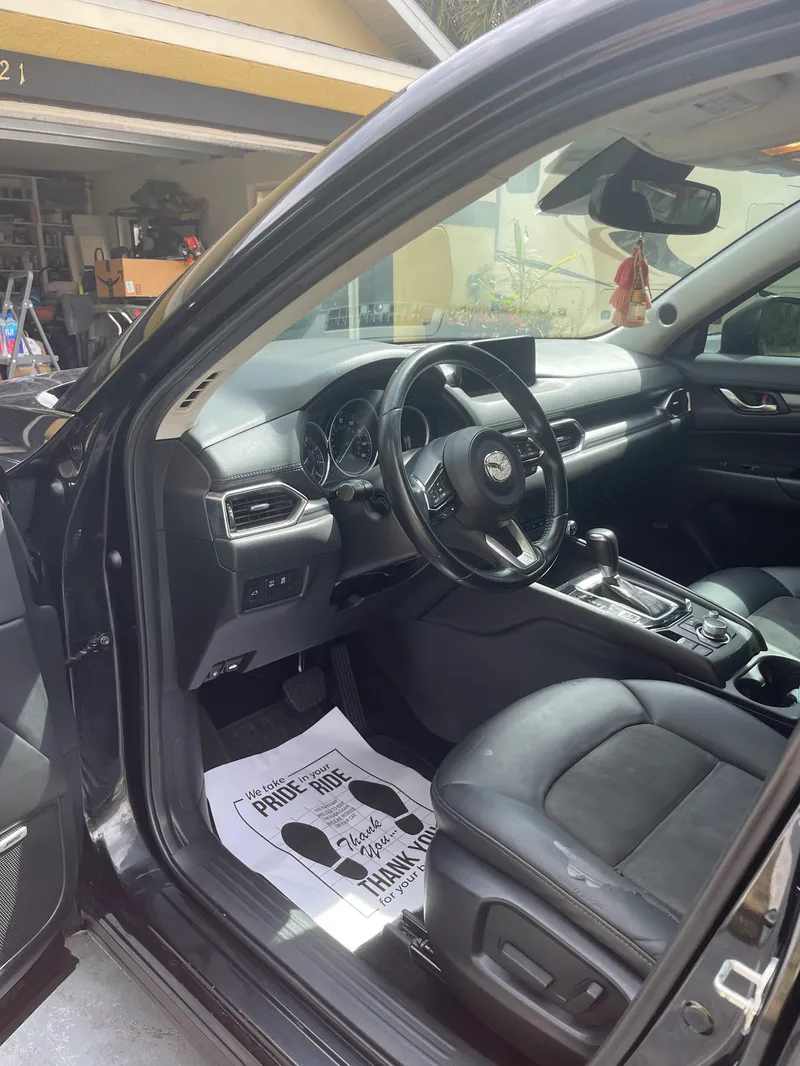 Mazda CX-5 black leather interior professionally cleaned in North Port, FL
