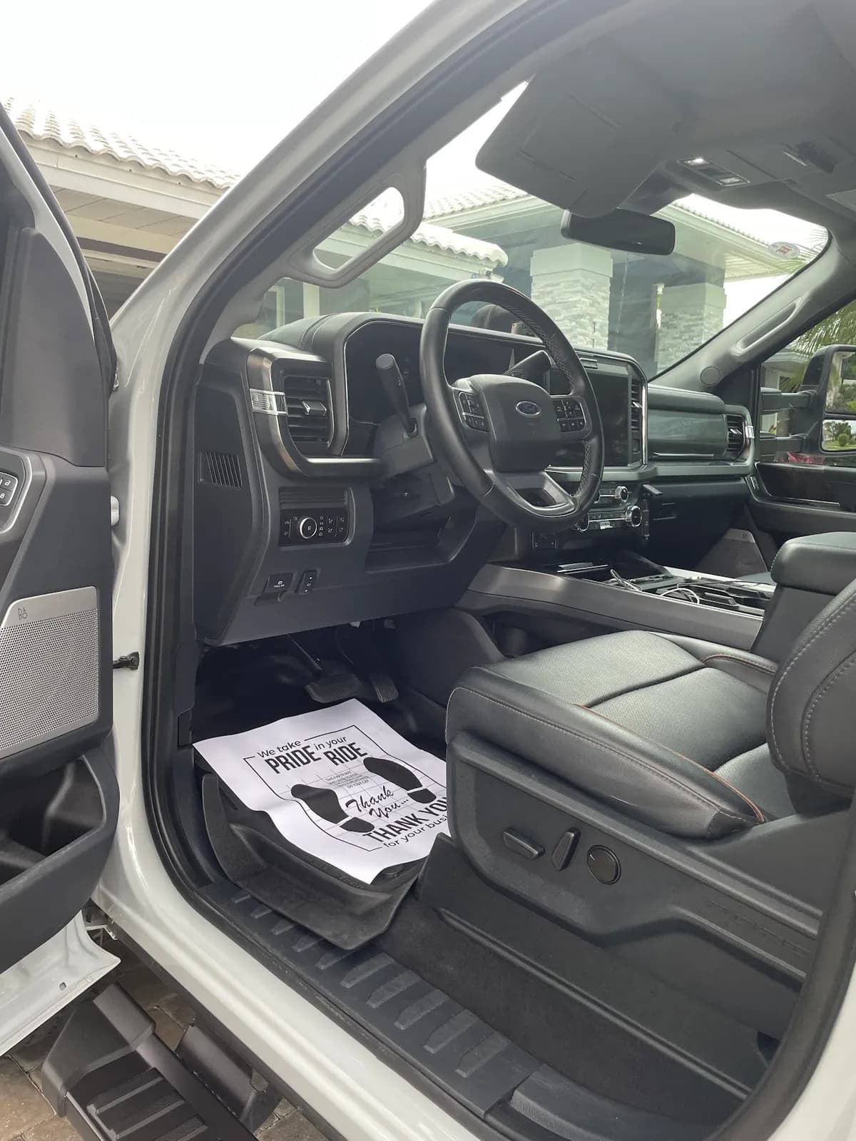 Immaculate black leather interior of Ford F-250 Super Duty truck after professional interior detailing in North Port, FL by Sansanich Car Detailing